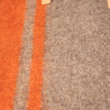 Reisedecke Steve von Duepuntootto Natur Orange